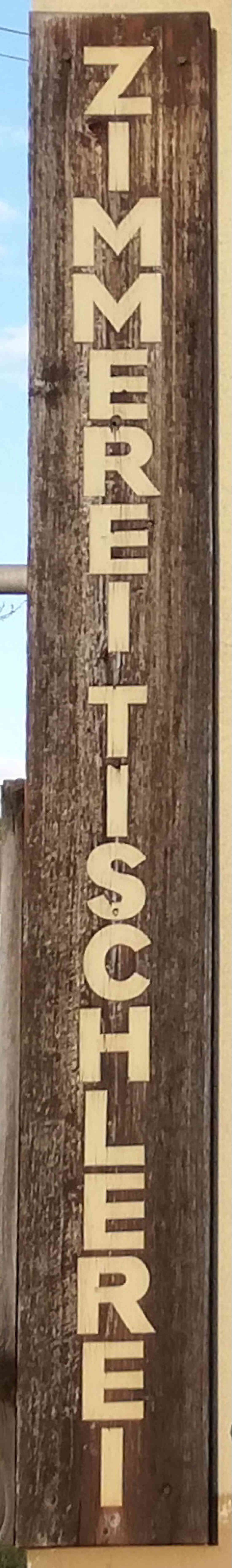 Firmentafel der Meistertischlerei Oswald am Herrschaftsweg 2 , Schild Nummer 12